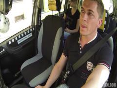 A young blonde gets fucked in a taxi